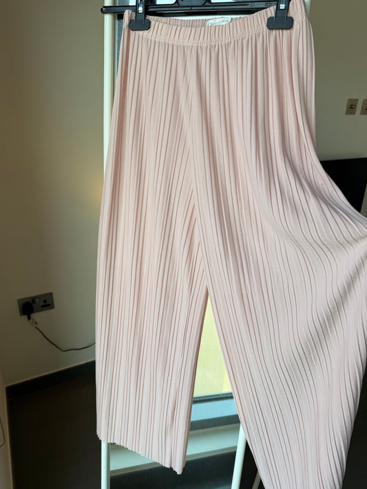 Pink flowy trousers
