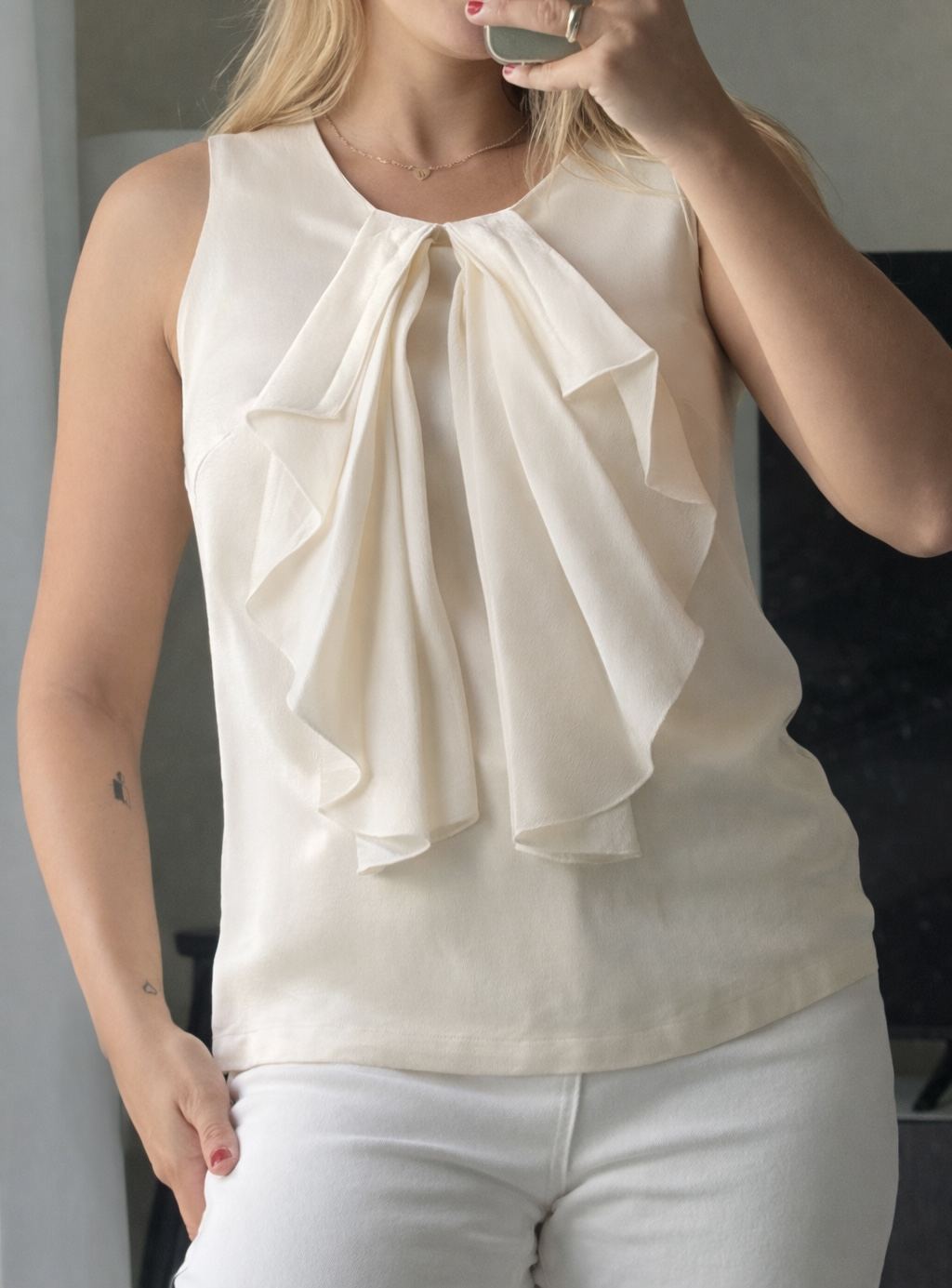 Cream Sleeveless Blouse with Ruffle Front Detail