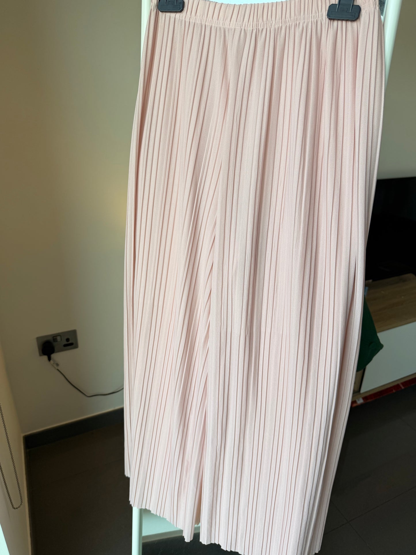 Pink flowy trousers