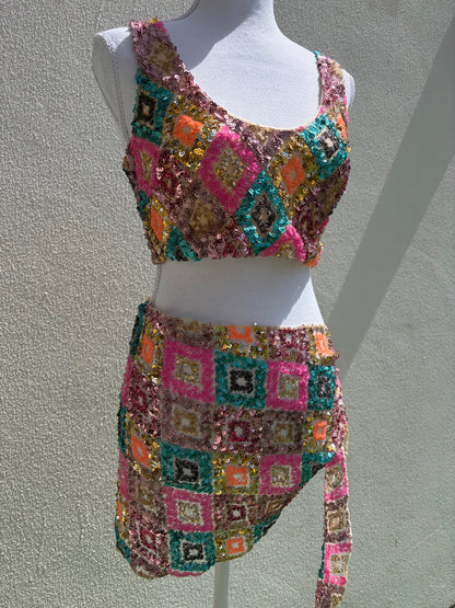 A vibrant three-piece sequin beach set