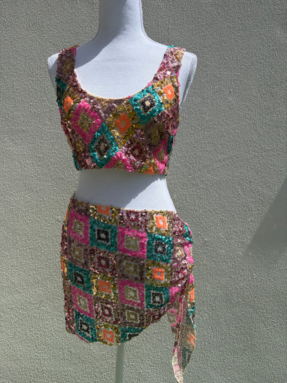 A vibrant three-piece sequin beach set